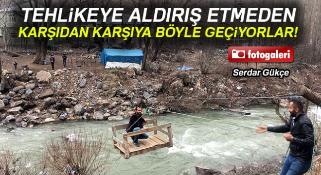 Habur Çayını teleferikle karşıya geçiyorlar